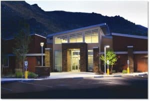 Carson Medical Group Med Parkway Campus building at night with lights on