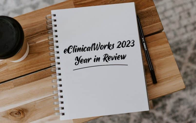 a notebook with the words eClinicalWorks 2023 Year in Review