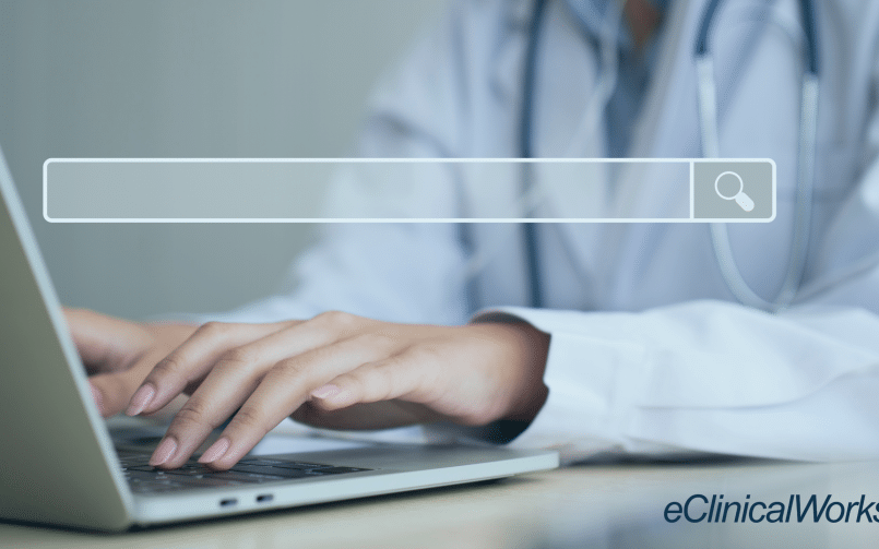 doctor searching on the computer to increase interoperability in healthcare