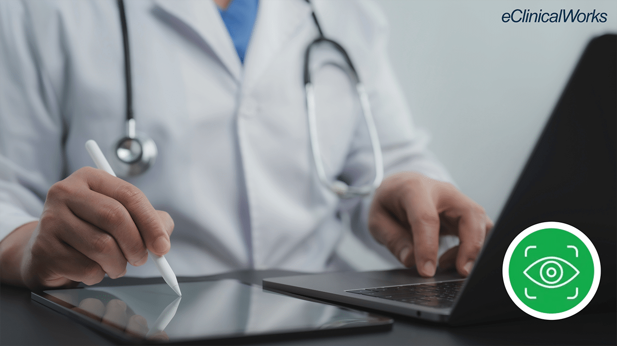 Doctor working at laptop and ipad, icon of Image AI fax from eClinicalWorks on screen.