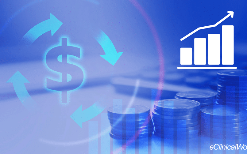 Icons of dollar signs and an increasing graph overlaid on a coin stack photo, representing revenue cycle management